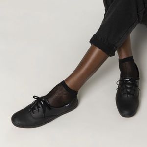 Never worn black leather Keds